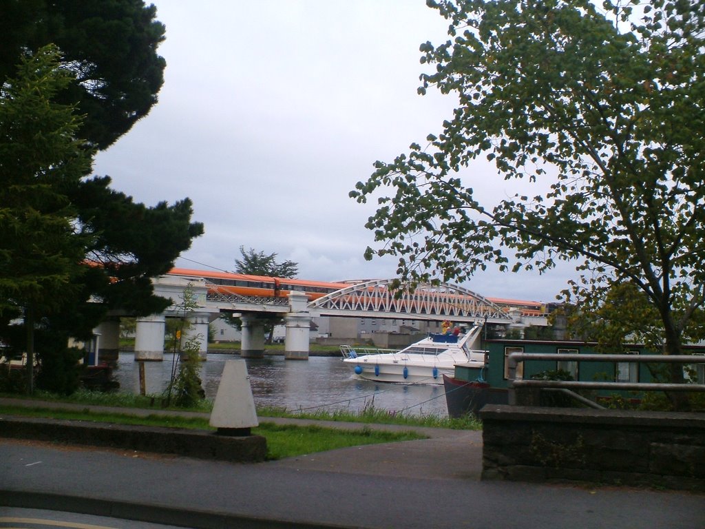 Train and Boat at river Shannon